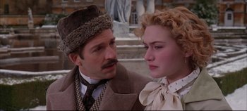 Movie still from “Hamlet” (1996), directed by Kenneth Branagh – A man and a woman standing next to each other; Close Up shot, Low angle