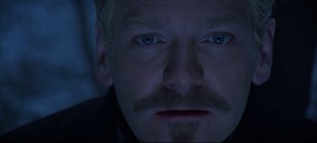 Movie still from “Hamlet” (1996), directed by Kenneth Branagh – A person with a mustache; Close Up shot, Overhead angle