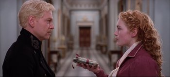 Movie still from “Hamlet” (1996), directed by Kenneth Branagh – A man and a woman are looking at each other; Medium shot, Over the shoulder angle