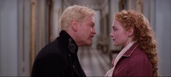 Movie still from “Hamlet” (1996), directed by Kenneth Branagh – A man and a woman face to face in a room; Close Up shot, Over the shoulder angle