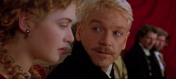 Movie still from “Hamlet” (1996), directed by Kenneth Branagh – A man and a woman looking at one another; Close Up shot, Over the shoulder angle