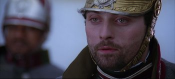 Movie still from “Hamlet” (1996), directed by Kenneth Branagh – A person wearing a helmet; Close Up shot, Low angle