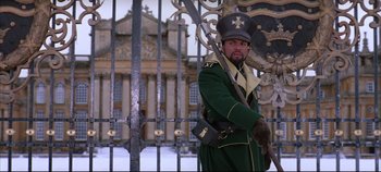 Movie still from “Hamlet” (1996), directed by Kenneth Branagh – A man dressed as a soldier holding a sword; Medium shot, Low angle