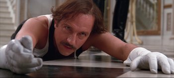 Movie still from “Hamlet” (1996), directed by Kenneth Branagh – A person laying on the ground; Close Up shot, Low angle