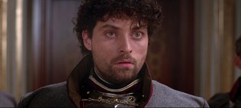 Movie still from “Hamlet” (1996), directed by Kenneth Branagh – A person wearing a neck brace; Close Up shot, Low angle