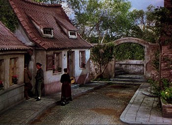 Movie still from “Hans Christian Andersen” (1952), directed by Charles Vidor – A painting of people walking down the street; Wide shot, High angle