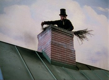 Movie still from “Hans Christian Andersen” (1952), directed by Charles Vidor – A man in a top hat is on top of a chimney; Wide shot, Low angle