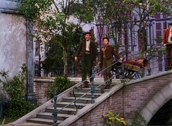 Movie still from “Hans Christian Andersen” (1952), directed by Charles Vidor – Two men walking down a set of stairs; Wide shot, Low angle