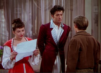 Movie still from “Hans Christian Andersen” (1952), directed by Charles Vidor – A group of people standing next to each other in a room; Medium shot, High angle