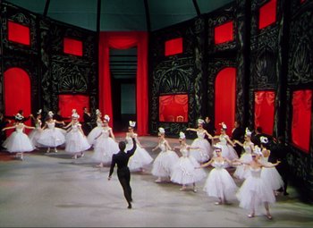 Movie still from “Hans Christian Andersen” (1952), directed by Charles Vidor – A group of ballerinas in white tutus and white dresses; Wide shot, High angle