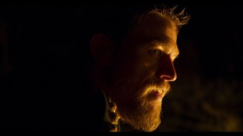 Movie still from “True History of the Kelly Gang” (2019), directed by Justin Kurzel – A person with a beard; Close Up shot, Over the shoulder angle