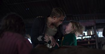 Movie still from “True History of the Kelly Gang” (2019), directed by Justin Kurzel – A man and a woman are playing a game; Medium shot, Over the shoulder angle