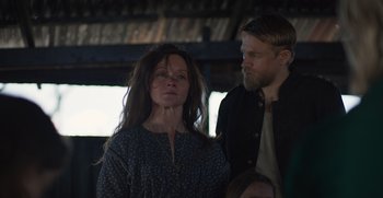 Movie still from “True History of the Kelly Gang” (2019), directed by Justin Kurzel – A man and a woman standing next to each other; Medium shot, Over the shoulder angle