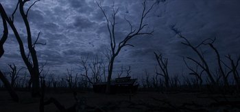 Movie still from “True History of the Kelly Gang” (2019), directed by Justin Kurzel – A dead tree in the middle of the night; Extreme Wide shot, Low angle