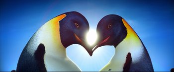 Movie still from “Happy Feet” (2006), directed by Warren Coleman – A couple of birds that are in the shape of a heart; Extreme Close Up shot, Low angle