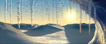 Movie still from “Happy Feet” (2006), directed by Warren Coleman – The sun is shining through the icicles on a snowy day; Extreme Wide shot, High angle
