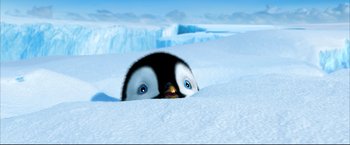 Movie still from “Happy Feet” (2006), directed by Warren Coleman – A penguin peeks its head out of the snow; Extreme Wide shot, High angle