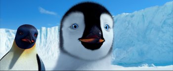 Movie still from “Happy Feet” (2006), directed by Warren Coleman – A baby penguin's face with an orange beak; Close Up shot, Low angle