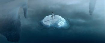 Movie still from “Happy Feet” (2006), directed by Warren Coleman – A penguin standing on top of an iceberg in the middle of the ocean; Extreme Wide shot, High angle
