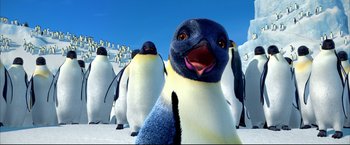 Movie still from “Happy Feet” (2006), directed by Warren Coleman – Many penguins that are standing in the snow; Close Up shot, Low angle