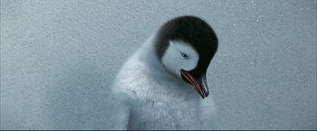 Movie still from “Happy Feet” (2006), directed by Warren Coleman – A bird with a beak open; Close Up shot, Low angle