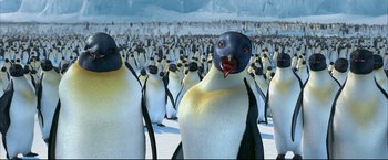 Movie still from “Happy Feet” (2006), directed by Warren Coleman – A large group of penguins in the snow; Close Up shot, Low angle