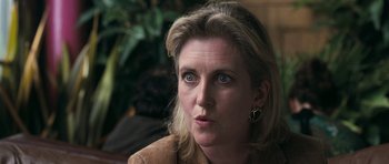 Movie still from “Happy-Go-Lucky” (2008), directed by Mike Leigh – A person looking at the camera; Close Up shot, Over the shoulder angle