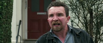 Movie still from “Happy-Go-Lucky” (2008), directed by Mike Leigh – A person with a beard; Close Up shot, Low angle