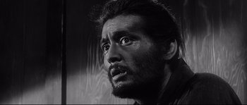 Movie still from “Harakiri” (1962), directed by Masaki Kobayashi – Black and white photograph of a man with a beard; Close Up shot, Low angle