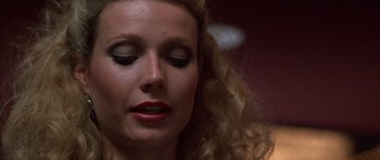 Movie still from “Hard Eight” (1996), directed by Paul Thomas Anderson – A person with eyes closed; Close Up shot, Overhead angle