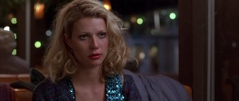 Movie still from “Hard Eight” (1996), directed by Paul Thomas Anderson – A person with long blonde hair; Close Up shot, Over the shoulder angle