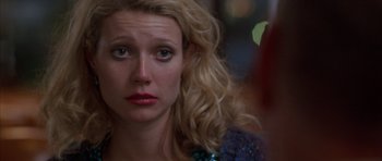 Movie still from “Hard Eight” (1996), directed by Paul Thomas Anderson – A person with blonde hair; Close Up shot, Over the shoulder angle