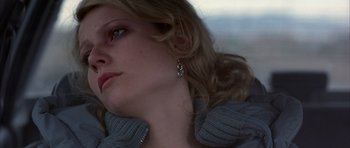 Movie still from “Hard Eight” (1996), directed by Paul Thomas Anderson – A person wearing a jacket; Close Up shot, Low angle