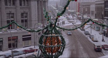 Movie still from “Hardcore” (1979), directed by Paul Schrader – A street scene with a traffic light and christmas decorations; Extreme Wide shot, High angle