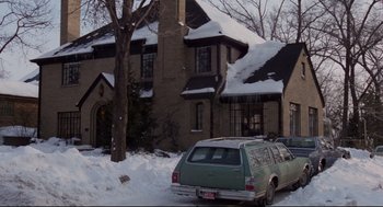 Movie still from “Hardcore” (1979), directed by Paul Schrader – A car parked in front of a house in the snow; Wide shot, Low angle