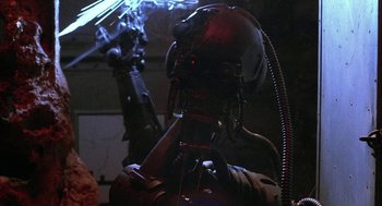 Movie still from “Hardware” (1990), directed by Richard Stanley – The head of an artificial robot; Close Up shot, Low angle
