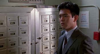 Movie still from “Harold & Kumar Go to White Castle” (2004), directed by Danny Leiner – A man standing in front of a bunch of mailboxes; Close Up shot, Low angle