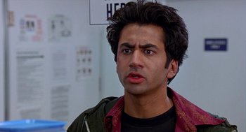 Movie still from “Harold & Kumar Go to White Castle” (2004), directed by Danny Leiner – A person wearing a jacket; Close Up shot, Over the shoulder angle